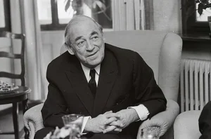 Alvar Aalto in a chair.