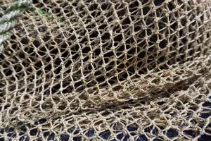 A light brown fishing net.