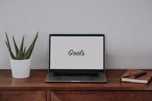Effective Geofencing In Marketing: Boost Sales And Engagement 4 A laptop with goals on it with a white background.
