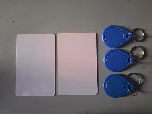 Rfid tags and sensors on a white table.