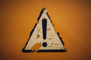Creating A Company Culture Deck That Works In 4 Easy Steps 4 A caution sign with an orange background.