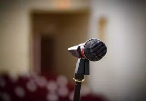 A microphone in a room to represent brand voice.