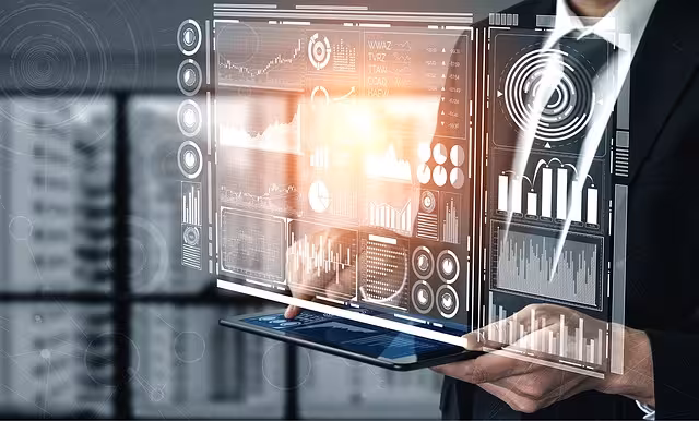 A person looking at business intelligence on a screen.