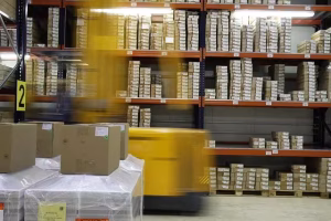 An ai forklift getting products in a warehouse.